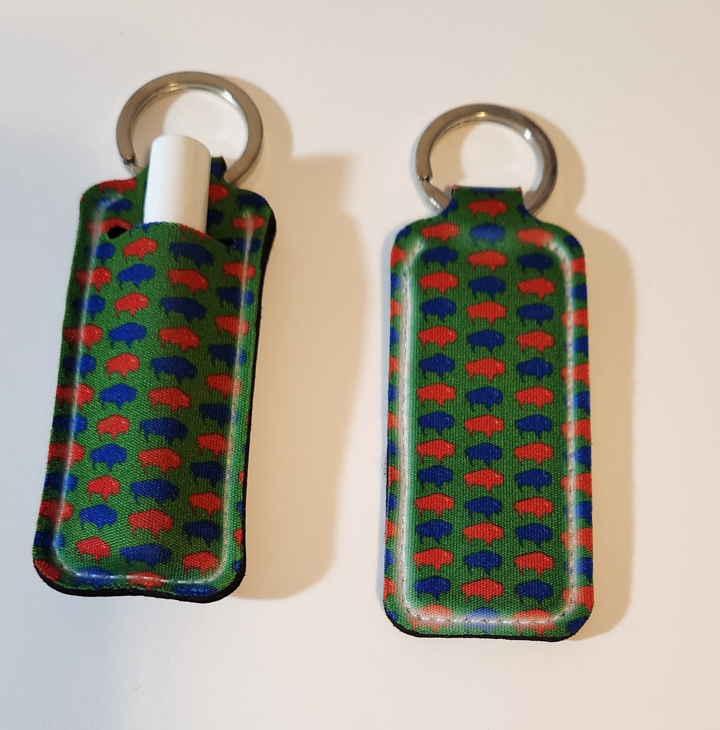 Green lip balm holder with blue and red Buffalos
