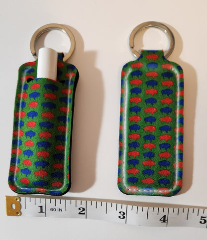 Green lip balm holder with blue and red Buffalos
