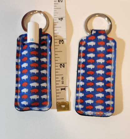 Blue lip balm holder with white and red Buffalos