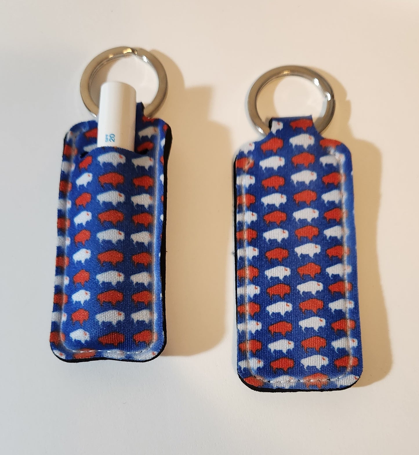 Blue lip balm holder with white and red Buffalos